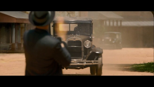 I probably wouldn’t have driven a slow car right towards the guy aiming a loaded machine gun at me, but that’s just me.