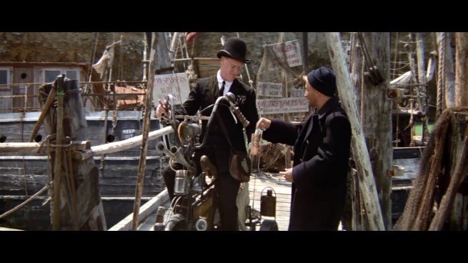 “There’s a tax for docking, tax for standing, tax for squinting one eye, and a tax for wearing that stupid hat.”     “Yeah?  Well looking at your hat, I’m sure you’re in a much higher ‘hat tax’ bracket than I am.”     “There’s an additional tax for making fun of my hat.”