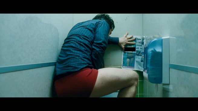 “Oh yeah!  Nothing gets my python rigid like tabloid tits!”