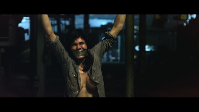 Oh, and she’s also not wearing a bra because of course not.  What the hell else would you expect from a crappy horror film?